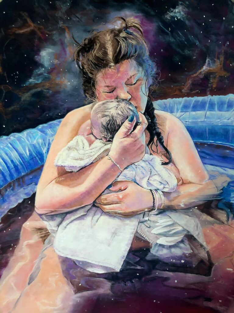IMG_0157 Mother holding her newborn, embracing the universe of new life